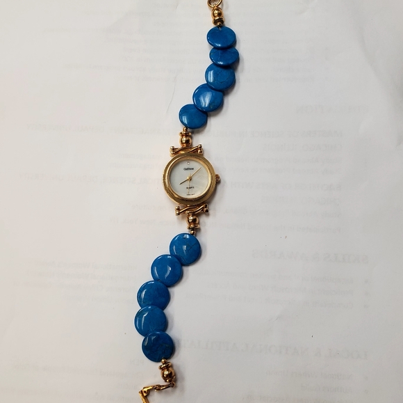 ON TIME WATCH GOLDTONE WITH MOP FACE AND TURQUOISE BAND 8in. - Picture 2 of 4